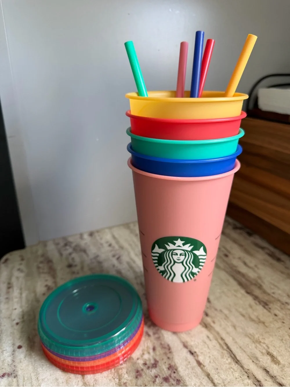 Starbucks Pink Reusable Tumbler with Multicolor Lids and Straws